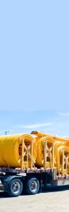 Truck carrying yellow hose